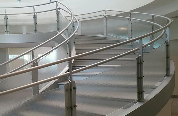 Textured art glass used in the Waubonsee custom glass railings, by Archetype Glass