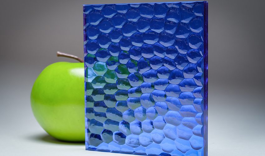 A feature image of the blue scalloped custom laminated glass FV-1914, crafted by Archetype Glass for the Q2 2022 QSP