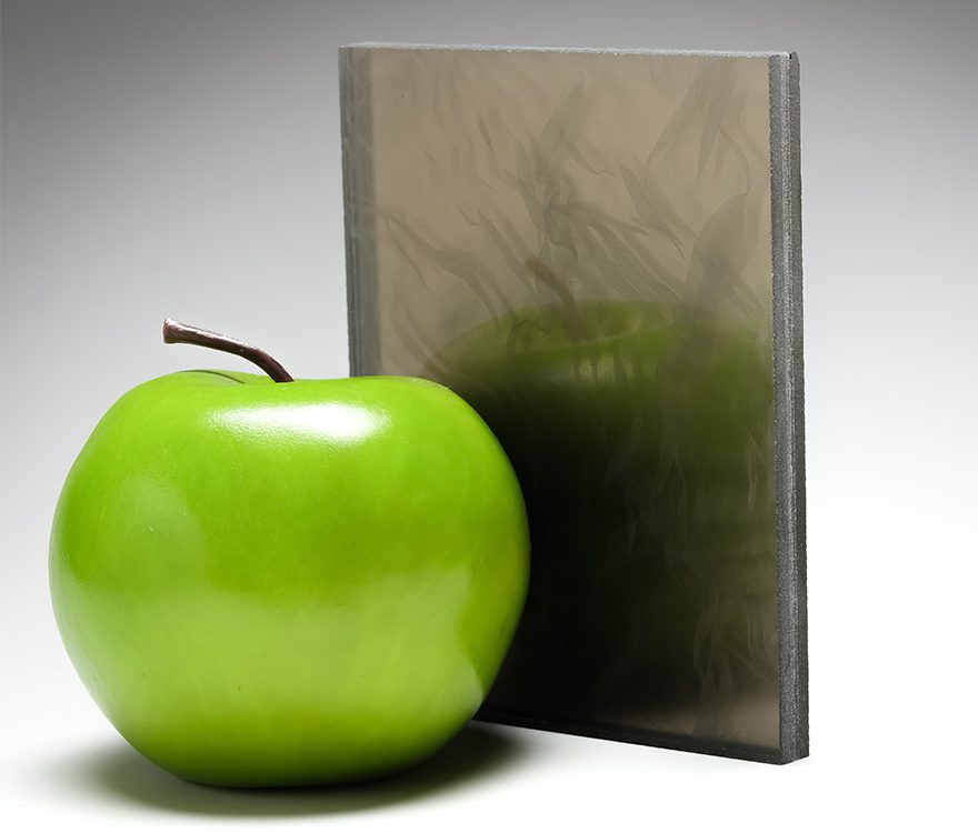 A mirrored fabric glass sample, featuring custom fabric from Spatial Element