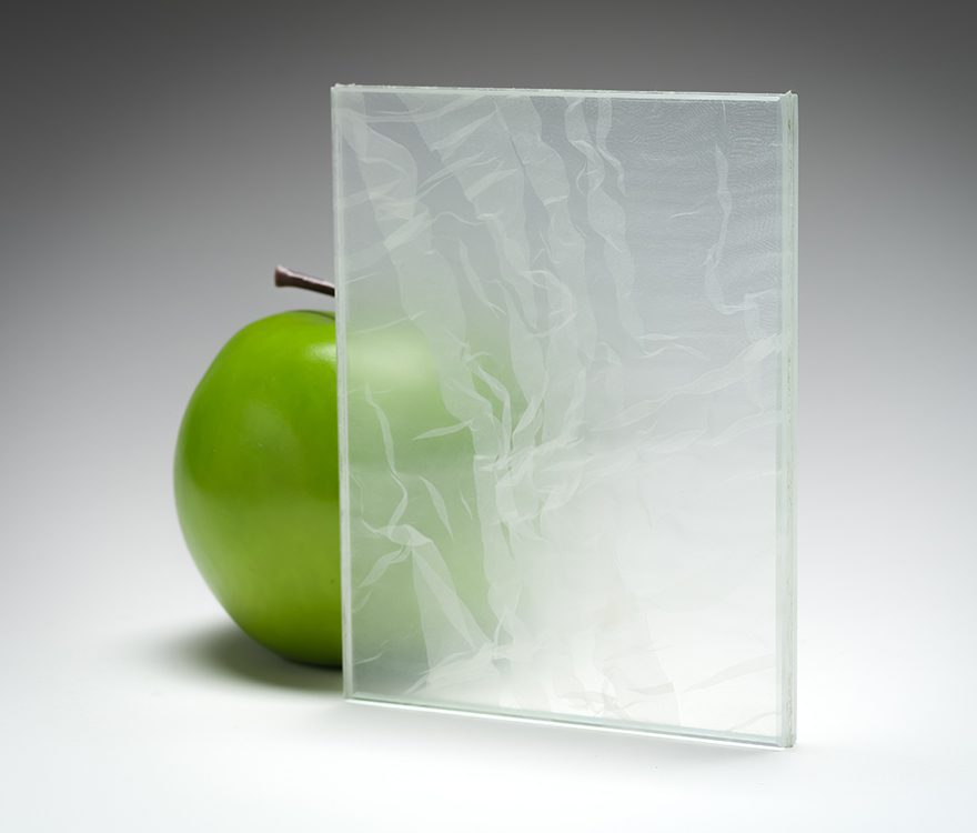 A clear transparent sample of the new custom fabric glass in coordination with Spatial Element.